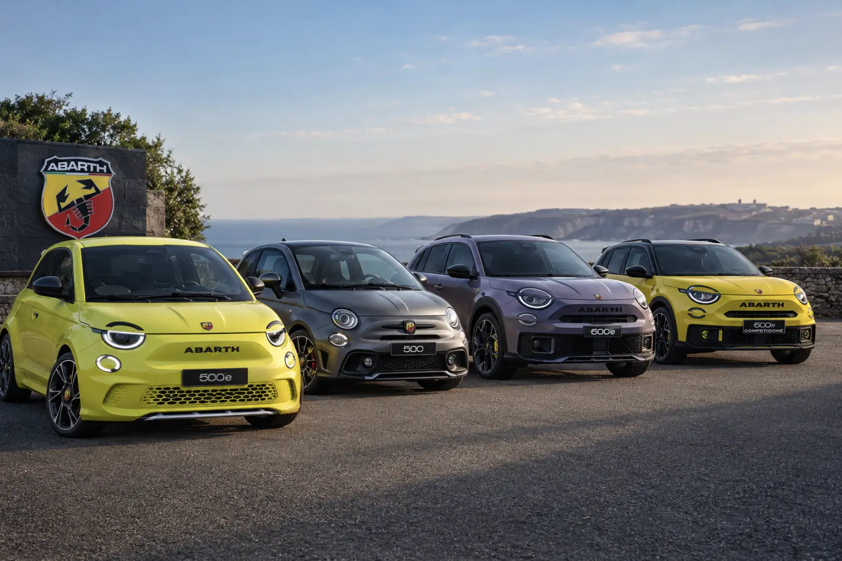 Abarth 595, 500e and 600e models together, illustrating the evolution of Abarth from petrol hot hatchbacks to its current electric range.